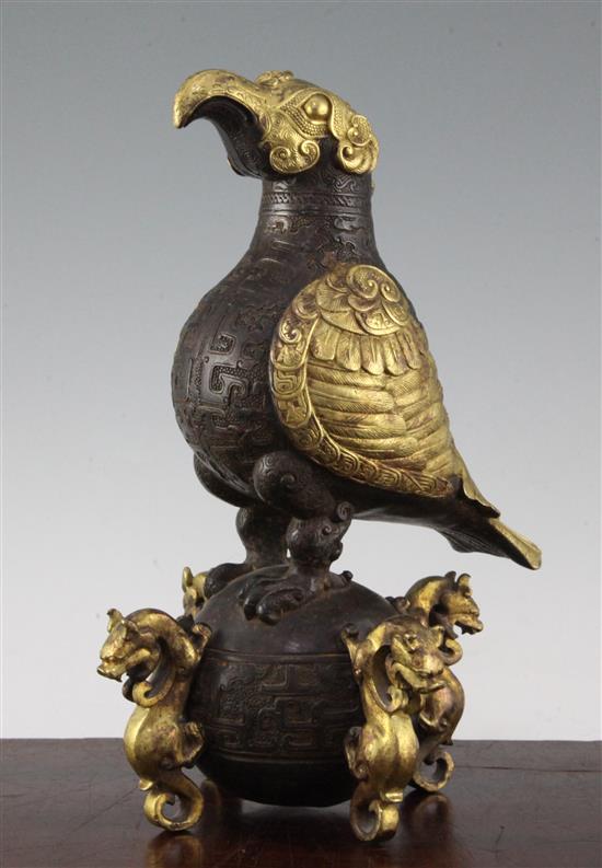 A Chinese part gilt bronze model of an eagle, in Han dynasty style, 29.5cm